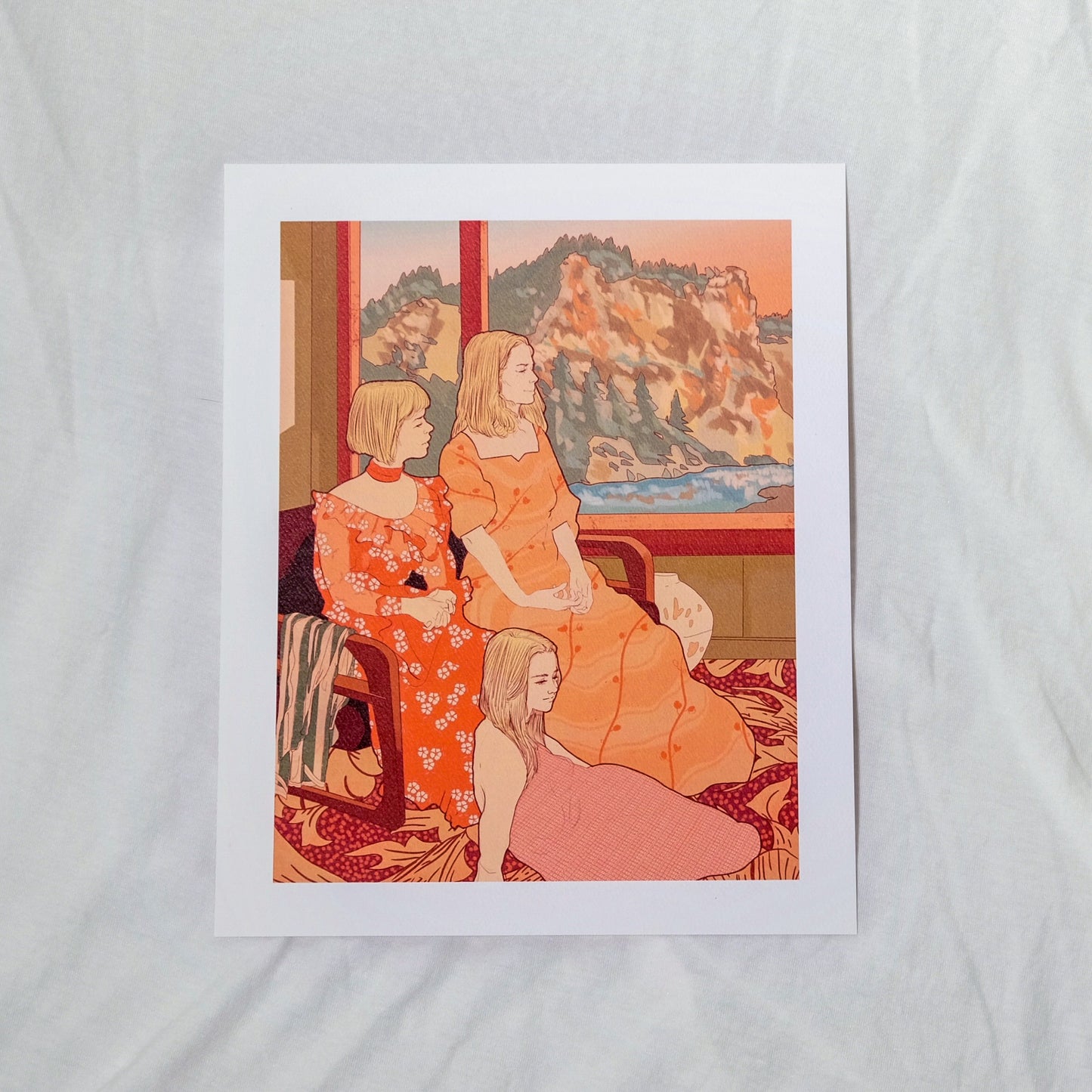 Illustration of three women in orange dresses sitting together with a scenic view outside.