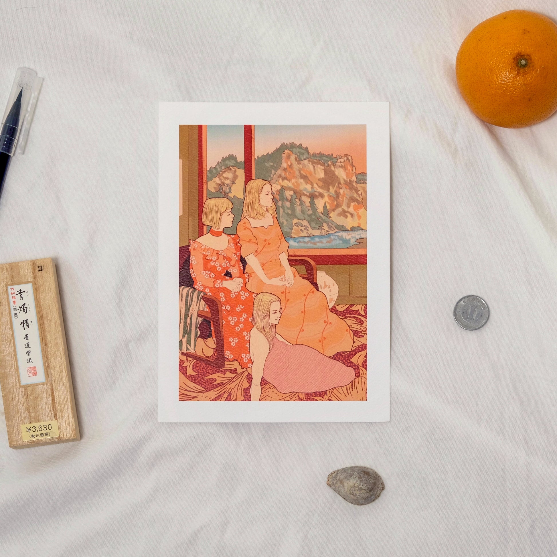 Vintage-style illustration of three women in a room with a scenic painting, placed on a light surface with an orange and pen.